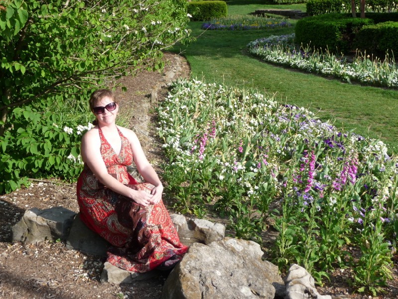 Annie and flowers.JPG